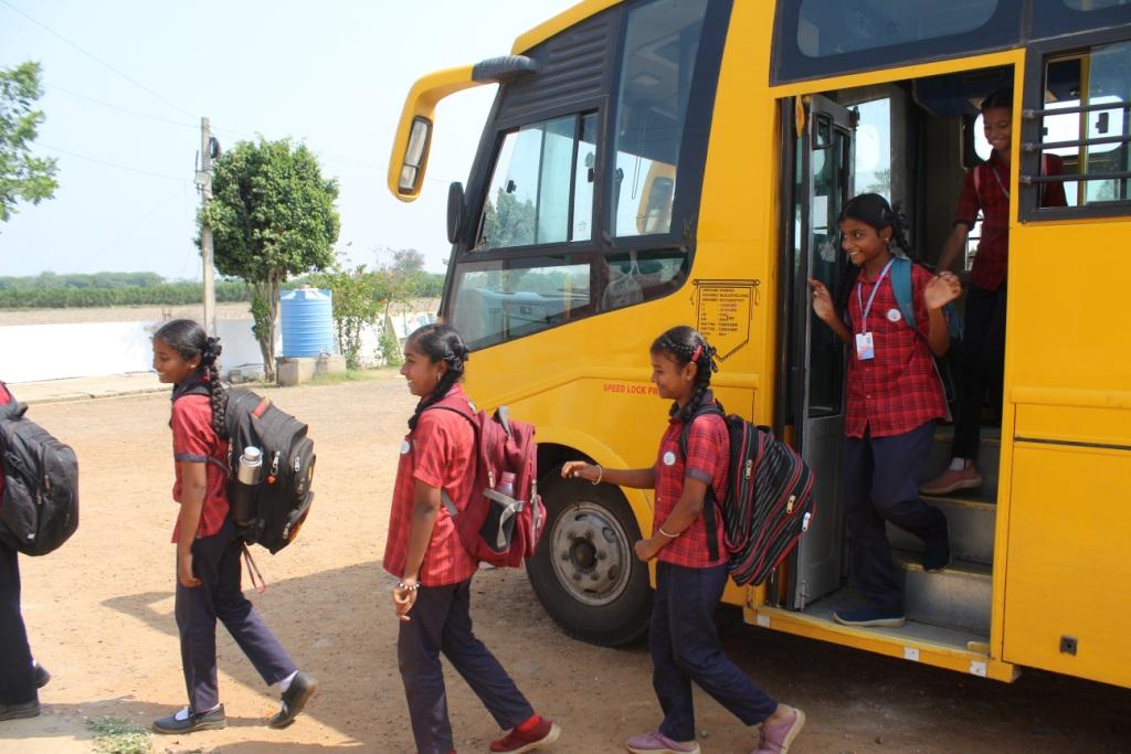 Pride International School transport buses and vans
